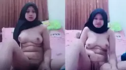 Abg Berjilbab Hitam Menggoda Dengan Remasan Payudara Yang Menggairahkan